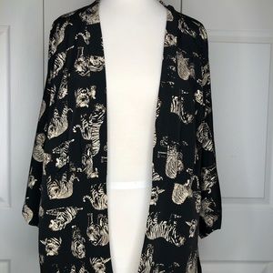 Kimono with repeat tiger design.